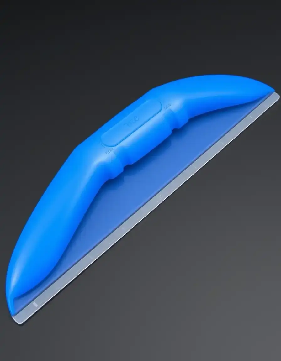 Strumento ergonomico in plastica blu per eliminare bolle d'aria dalla carta da parati