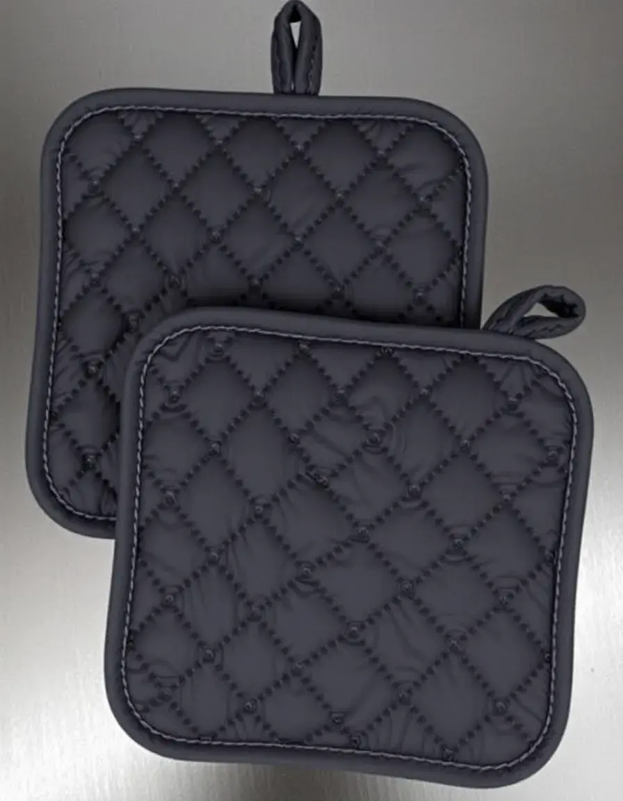 Set di 2 presine in cotone trapuntato nere