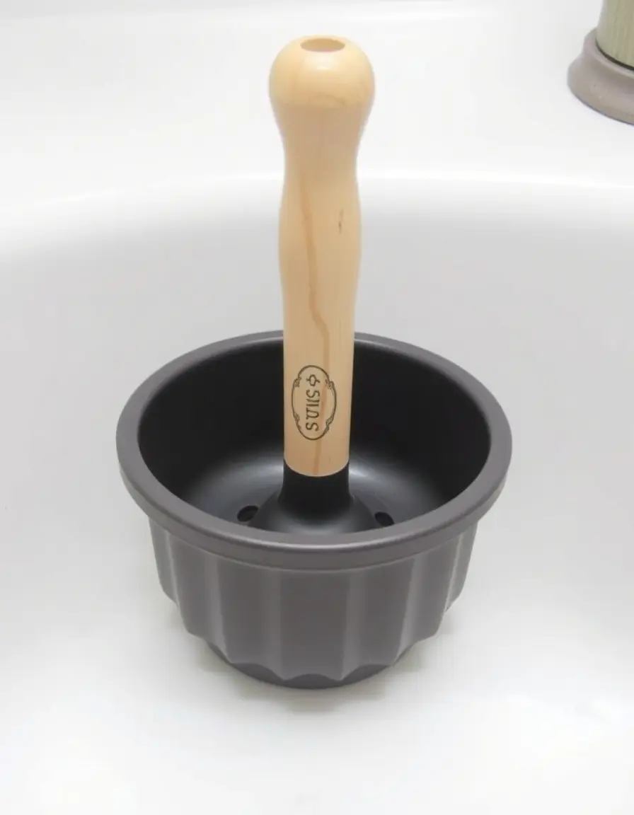 Piccolo sturalavandino manuale con manico in legno